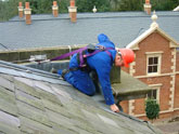 Roof Maintenance Work being carried out. Operative attached via UNILINE System